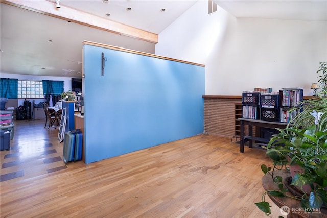 home office with wood finished floors and visible vents