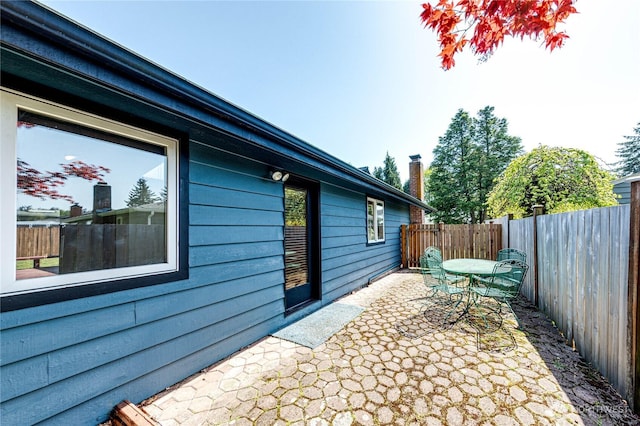 view of patio / terrace with a fenced backyard and outdoor dining area