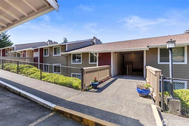 20145 Vikings Crest Loop NE Unit 3-105, Poulsbo, WA 98370 - view of side of home featuring fence