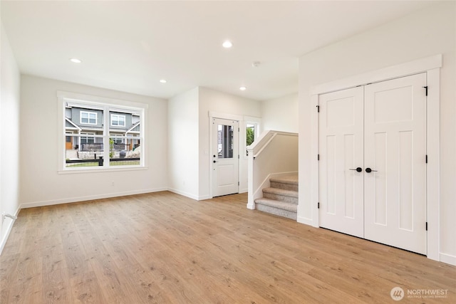 4230 Melrose Ln, Bellingham, WA 98226 - entrance foyer featuring light wood-style floors, stairway, and recessed lighting