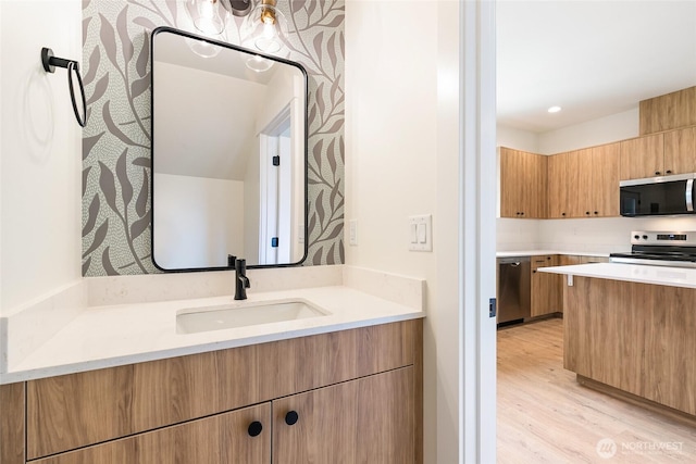 4230 Melrose Ln, Bellingham, WA 98226 - bathroom with wood finished floors and vanity