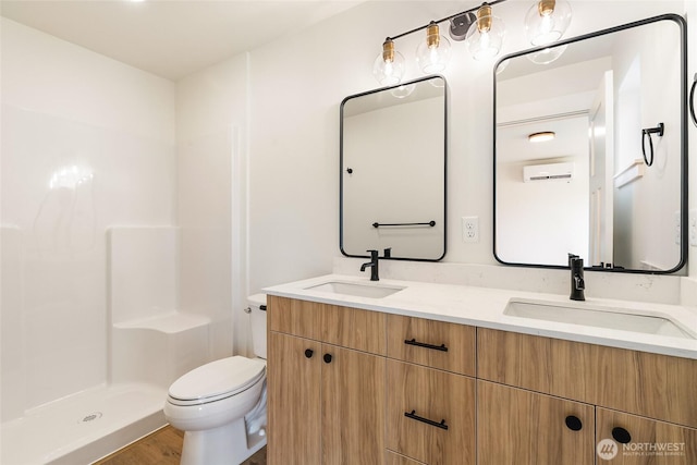 4230 Melrose Ln, Bellingham, WA 98226 - full bath featuring double vanity, wood finished floors, and a shower