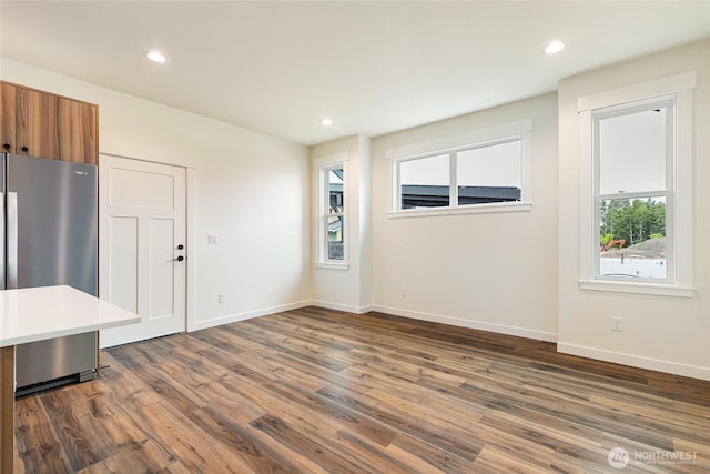 4232 Melrose Ln, Bellingham, WA 98226 - unfurnished living room with dark wood-style floors and recessed lighting