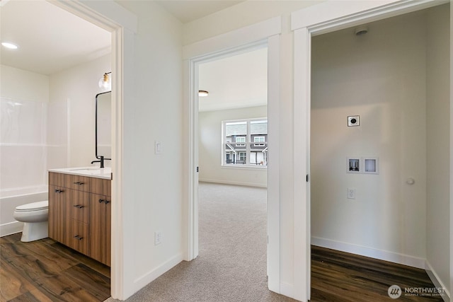 4232 Melrose Ln, Bellingham, WA 98226 - laundry area with hookup for an electric dryer, hookup for a washing machine, and dark wood finished floors