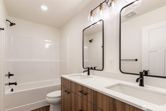 4232 Melrose Ln, Bellingham, WA 98226 - bathroom with double vanity, washtub / shower combination, wood finished floors, and recessed lighting