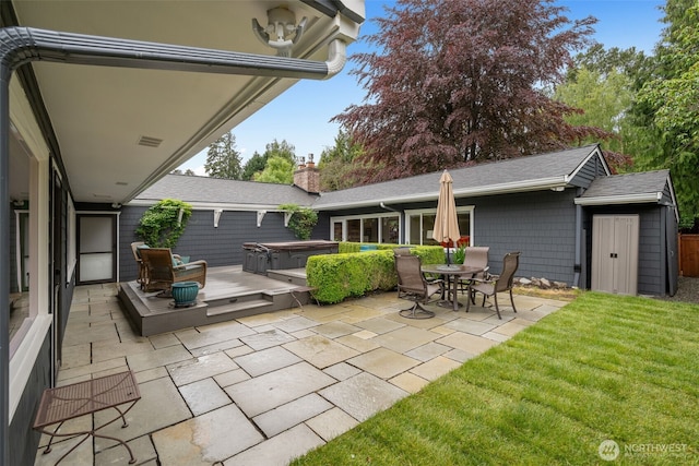 view of patio / terrace featuring a hot tub