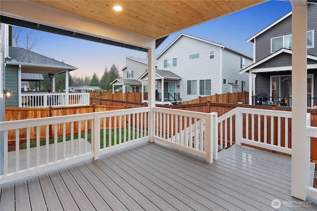 deck featuring a residential view and fence private yard