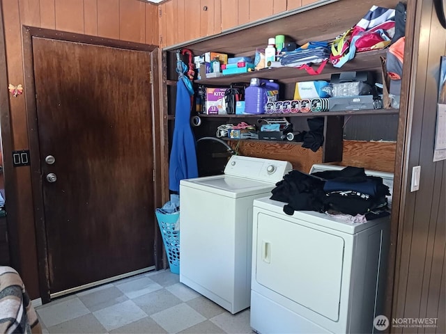 laundry room featuring washer and dryer, laundry area, and light floors
