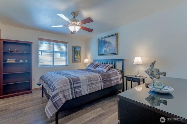 121 E Connemara Way, Shelton, WA 98584 - bedroom with wood finished floors and a ceiling fan