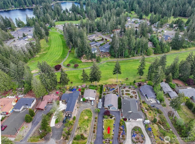 121 E Connemara Way, Shelton, WA 98584 - aerial view of property and surrounding area featuring a large body of water and nearby suburban area