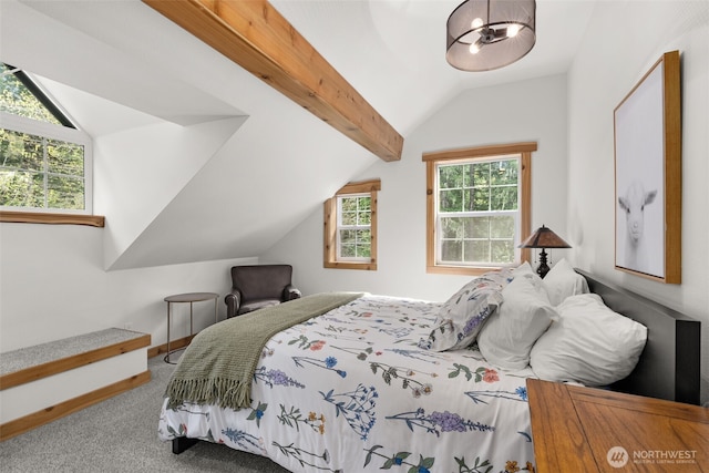 bedroom with carpet floors, baseboards, and vaulted ceiling
