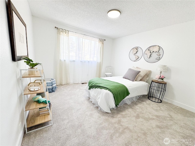 27526 26th Ave S, Federal Way, WA 98003 - bedroom featuring a textured ceiling, carpet floors, and baseboards