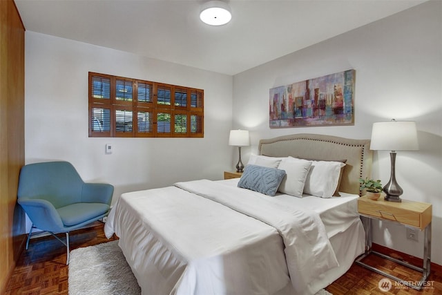 bedroom featuring baseboards
