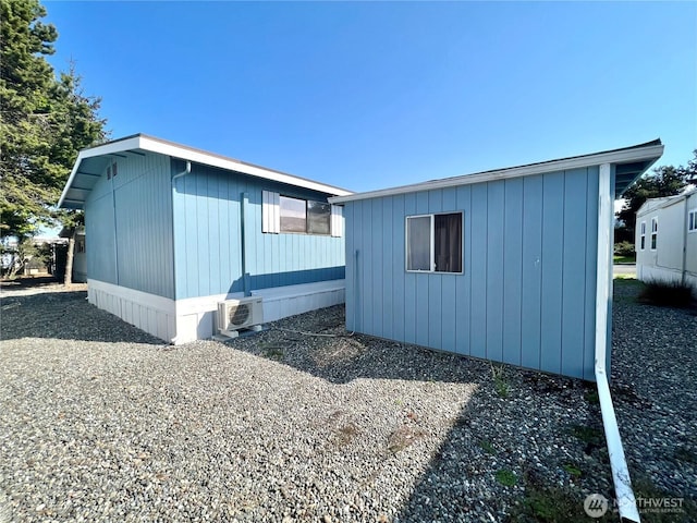 610 W Spruce St, Sequim, WA 98382 - view of side of property with ac unit and an outdoor structure