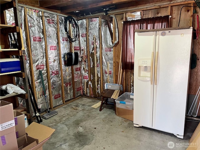 610 W Spruce St, Sequim, WA 98382 - unfinished below grade area with white refrigerator with ice dispenser
