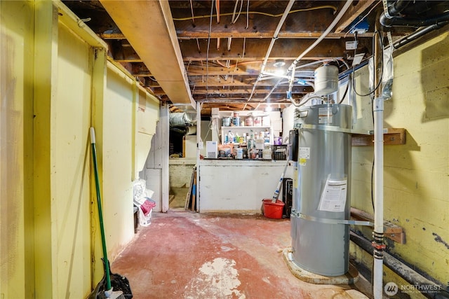 unfinished basement featuring water heater