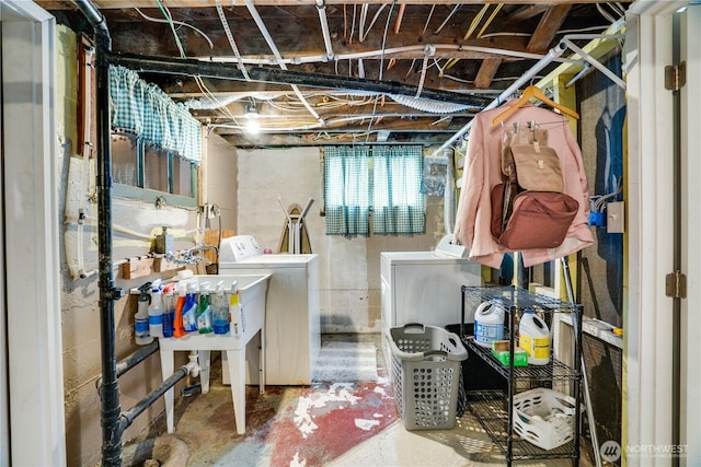 below grade area featuring washer and clothes dryer