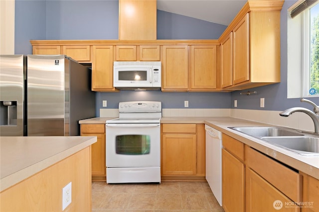4254 Roxanna Loop SE, Lacey, WA 98503 - kitchen with white appliances, a sink, light countertops, lofted ceiling, and light brown cabinets