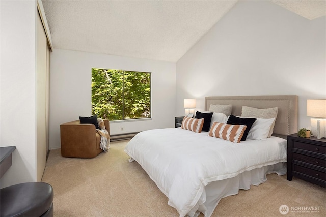 carpeted bedroom with a baseboard heating unit and vaulted ceiling