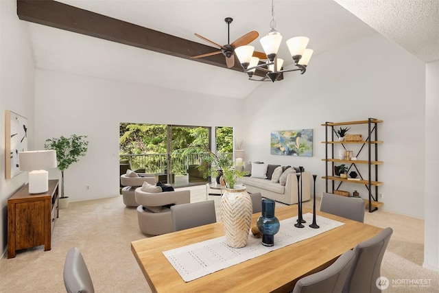 dining area with light colored carpet, a chandelier, high vaulted ceiling, and beam ceiling