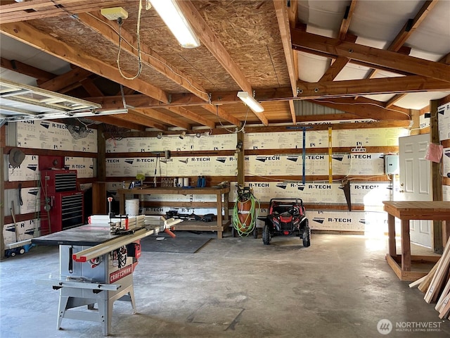 garage featuring a workshop area