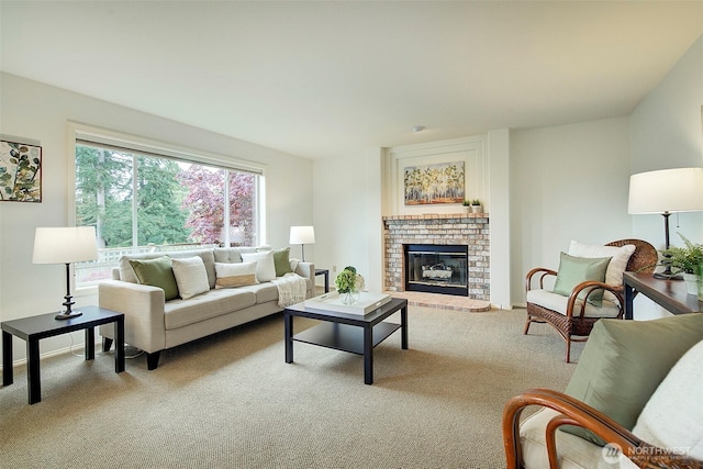 carpeted living area with a brick fireplace