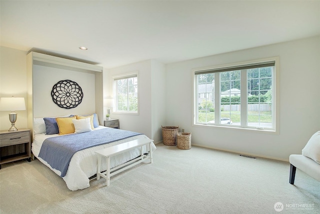 bedroom featuring visible vents, recessed lighting, carpet, and baseboards