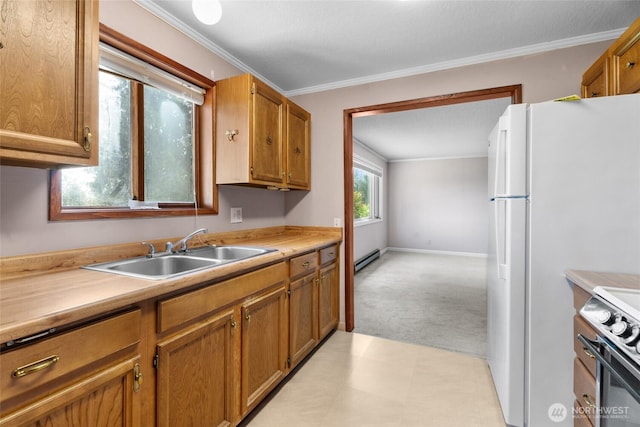 3837 Columbia Heights Rd, Longview, WA 98632 - kitchen with electric range, light colored carpet, brown cabinets, a sink, and light countertops