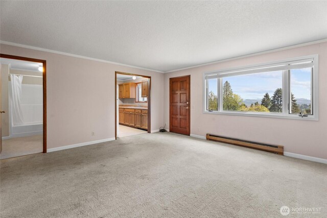 3837 Columbia Heights Rd, Longview, WA 98632 - interior space with crown molding, a baseboard radiator, a textured ceiling, and light colored carpet