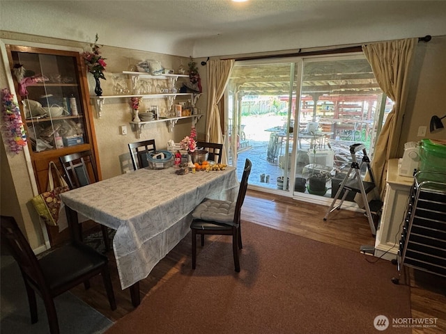 dining area featuring wood finished floors