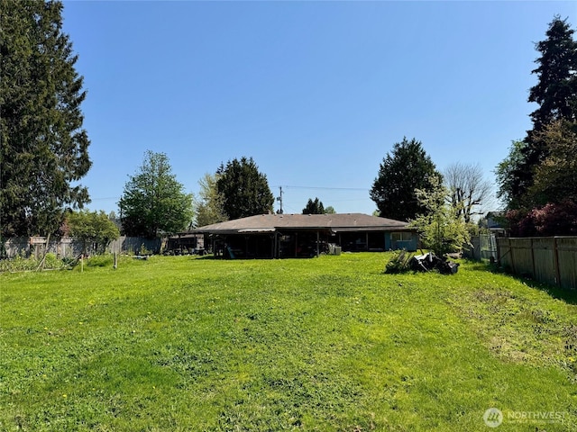 view of yard with fence