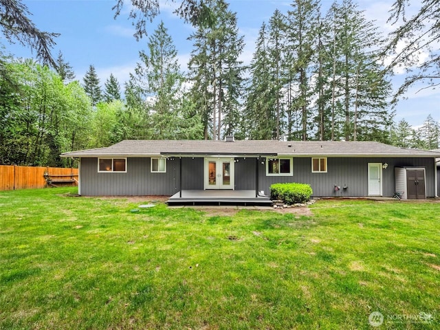 12916 97th Ave NW, Gig Harbor, WA 98329 - rear view of property with french doors, fence, a yard, and a deck