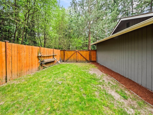12916 97th Ave NW, Gig Harbor, WA 98329 - view of yard featuring a fenced backyard and a gate