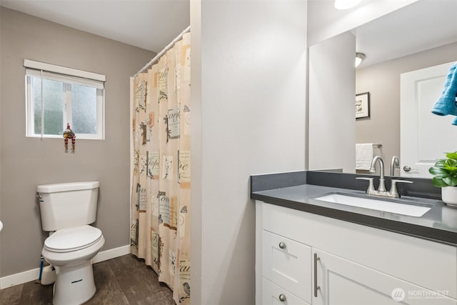 35622 4th Ave SW, Federal Way, WA 98023 - bathroom with wood finished floors, baseboards, vanity, and toilet