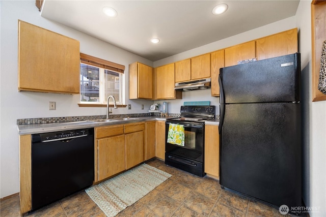 kitchen featuring under cabinet range hood, a sink, recessed lighting, and black appliances