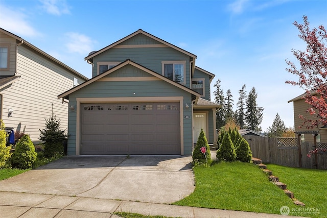 traditional home with an attached garage, driveway, fence, and a front yard
