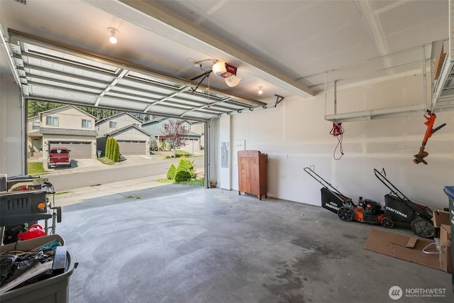 garage featuring a garage door opener