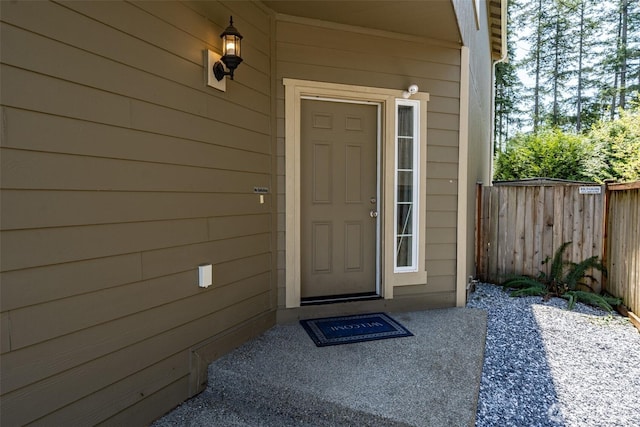 property entrance featuring fence