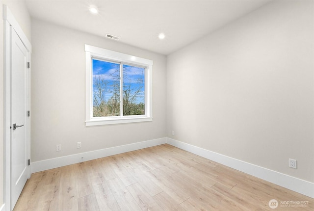 unfurnished bedroom with baseboards, light wood-style flooring, visible vents, and recessed lighting