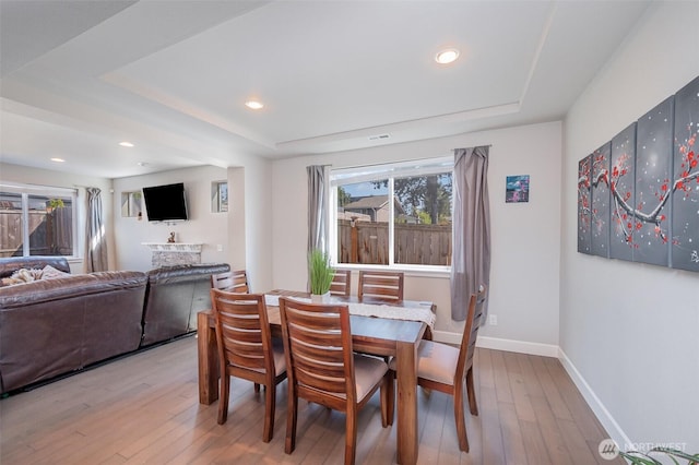 24524 96th Ave S, Kent, WA 98030 - dining room with a tray ceiling, hardwood / wood-style floors, recessed lighting, and baseboards