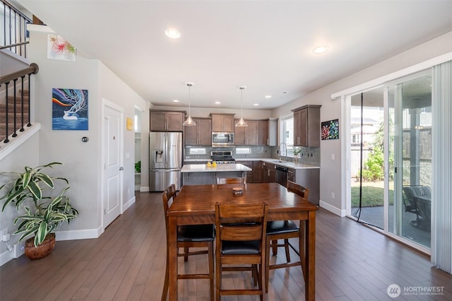 24524 96th Ave S, Kent, WA 98030 - dining area featuring dark wood-style flooring, baseboards, stairs, and recessed lighting