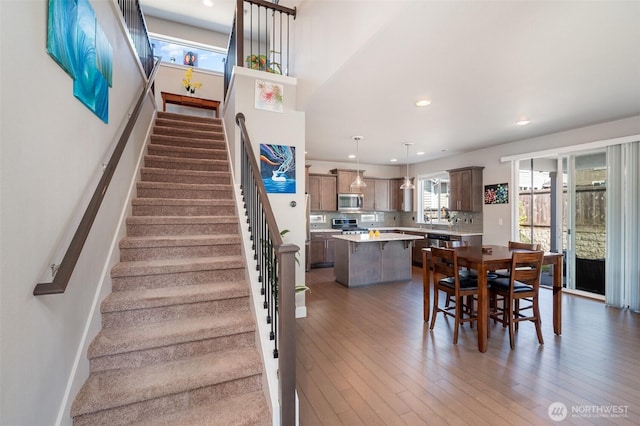 24524 96th Ave S, Kent, WA 98030 - stairs with wood finished floors and recessed lighting