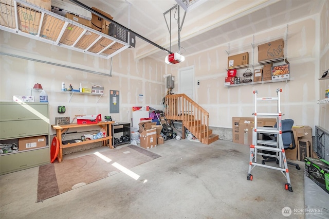 24524 96th Ave S, Kent, WA 98030 - garage featuring electric panel and a garage door opener