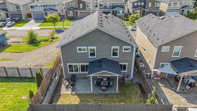 24524 96th Ave S, Kent, WA 98030 - rear view of property with a residential view, a patio, and central AC