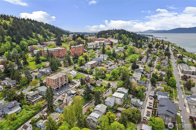 bird's eye view with a water and mountain view