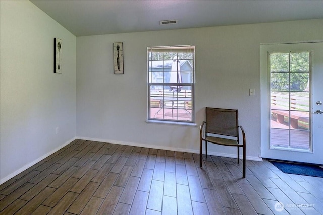 19802 118th Avenue Ct E, Graham, WA 98338 - unfurnished room featuring plenty of natural light and wood finished floors