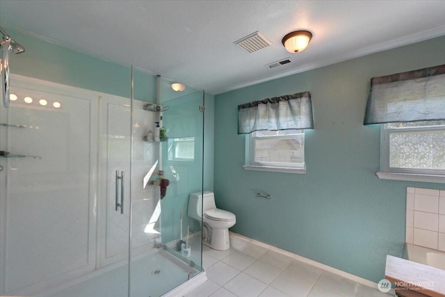 19802 118th Avenue Ct E, Graham, WA 98338 - bathroom with a stall shower and tile patterned floors