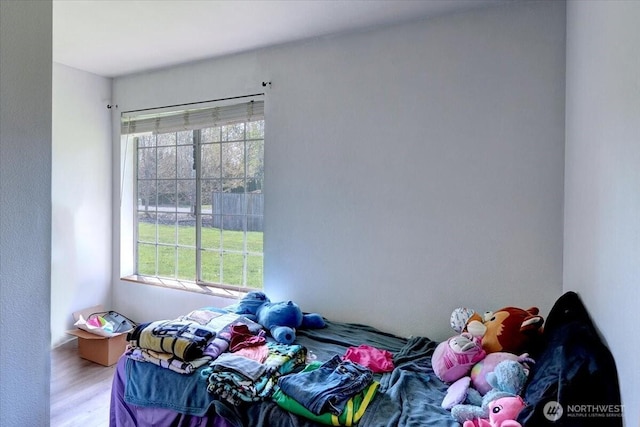 19802 118th Avenue Ct E, Graham, WA 98338 - unfurnished bedroom with multiple windows and wood finished floors