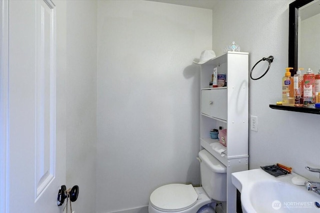 19802 118th Avenue Ct E, Graham, WA 98338 - half bathroom featuring toilet and vanity