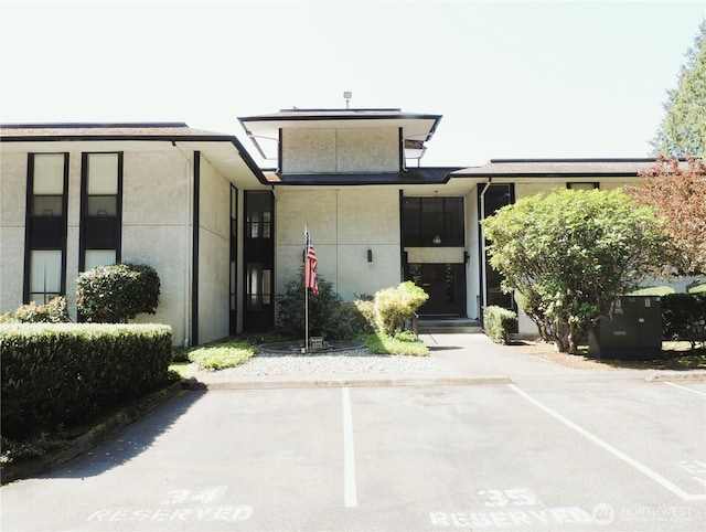 exterior space featuring uncovered parking